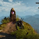 Geralt activating glowing Place of Power stone in White Orchard forest during rain.