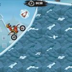 Rider performing backflip over icy ramp in Moto X3M Winter Unblocked 66 gameplay.